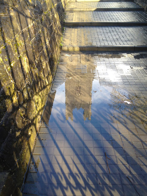 I left Kate Daly's pub and discovered this reflection just moments before my iPhone battery died. The blogging I did with in in Kate Daly's drained it....